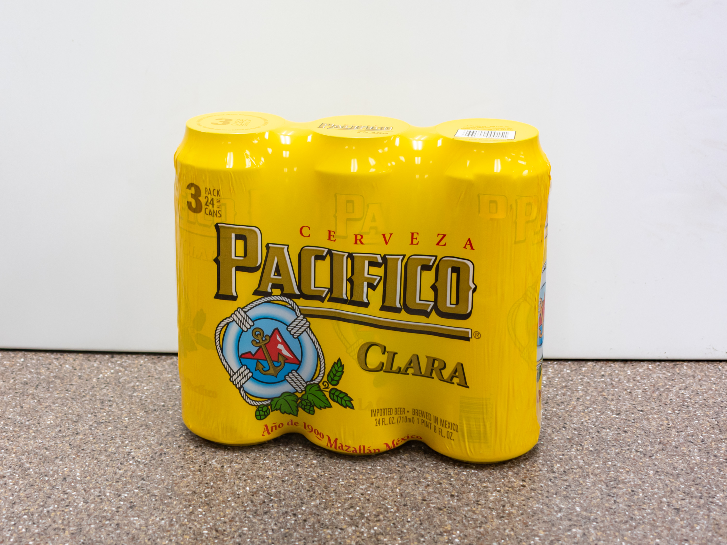 Order Pacifico Clara Mexican Lager Beer, 24 oz. Can - 3 Pack food online from Kangaroo Food Mart store, Cathedral City on bringmethat.com