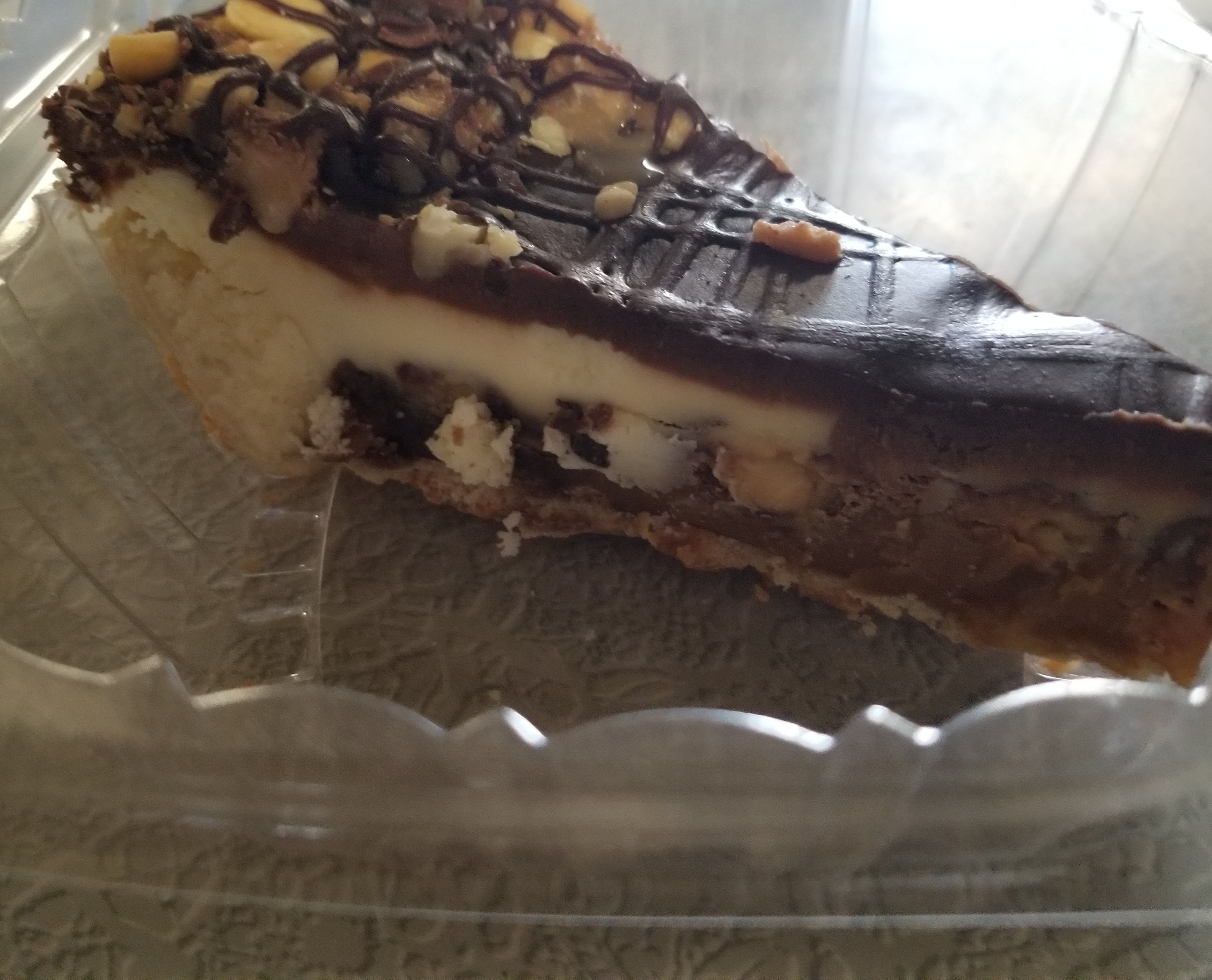Order Snickers pie - 1 slice food online from Novotny's Groceries & Pizza store, Worthington on bringmethat.com