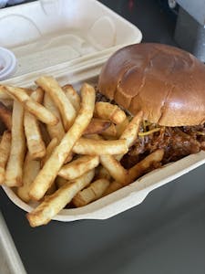Order HM Smk Pulled Pork Sandwich With Fries food online from Raven Cafe store, Juneau on bringmethat.com