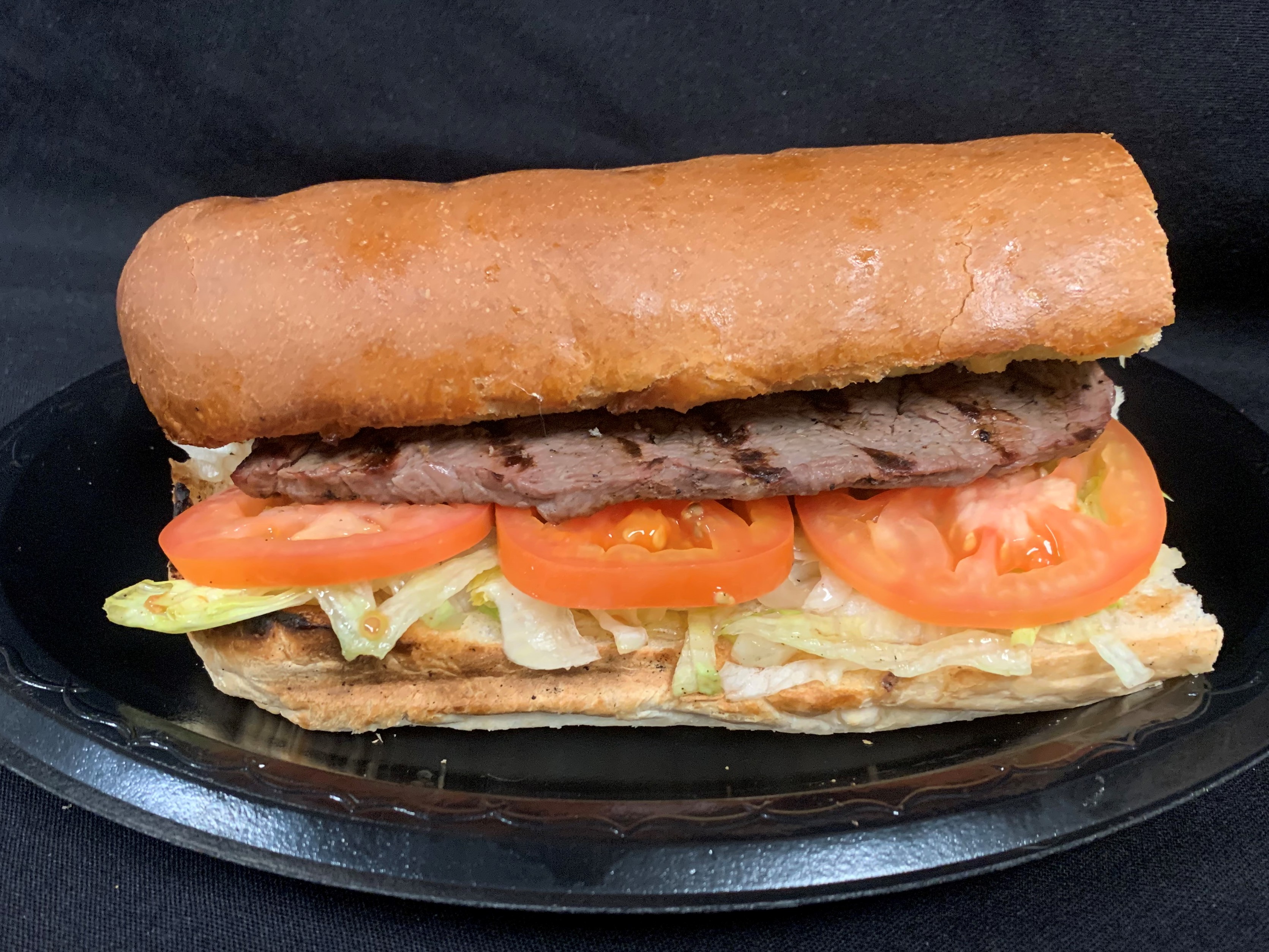 Order Steak Sandwich food online from Tony Subs & Pizza store, Inglewood on bringmethat.com