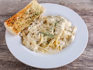 Order Fettuccine Alfredo with Grilled Chicken  food online from Rosatis Pizza store, Peoria on bringmethat.com