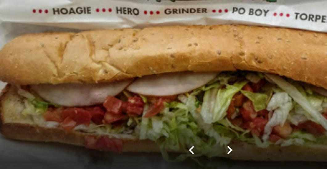 Order Ham Sub - Half food online from Val Pizza store, Owosso on bringmethat.com