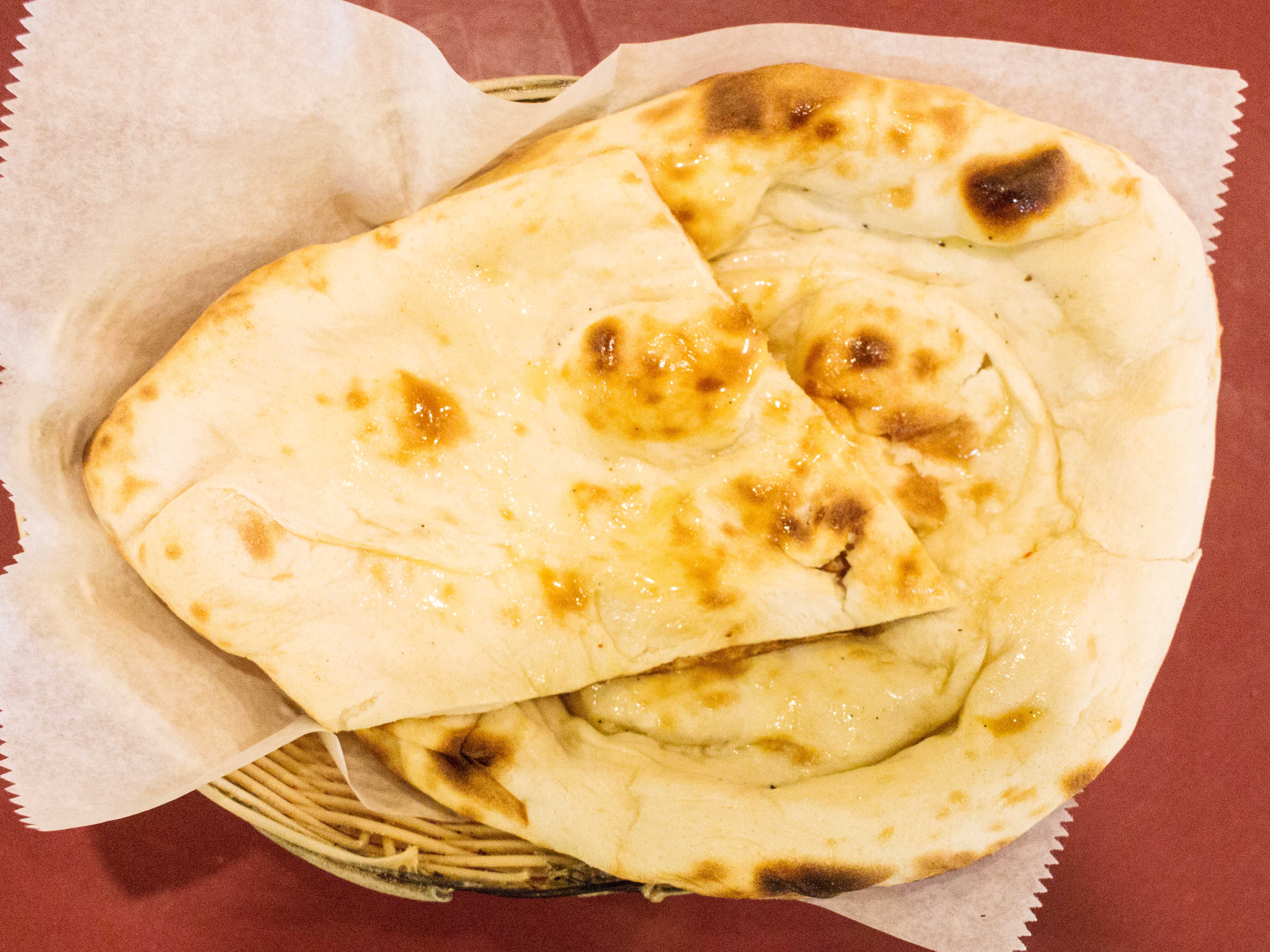 Order Naan food online from Raj Palace Indian Cuisine store, Livonia on bringmethat.com