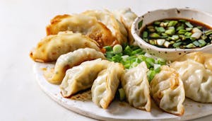 Order Chicken Dumpling (5) food online from Asian thai 2 go store, Dallas on bringmethat.com
