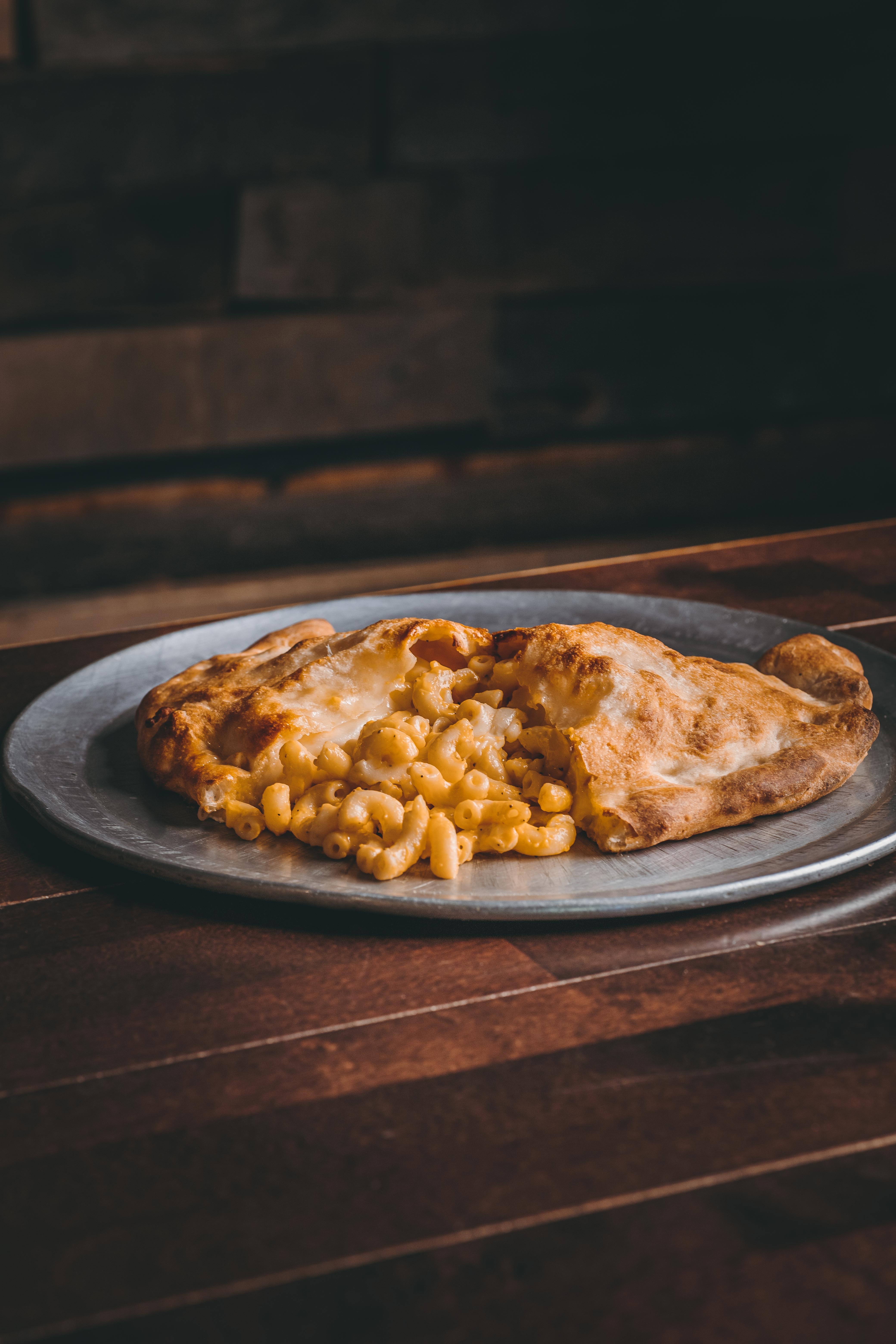 Order Mac & Cheese Calzone food online from ZA Pizzeria store, Seaford on bringmethat.com