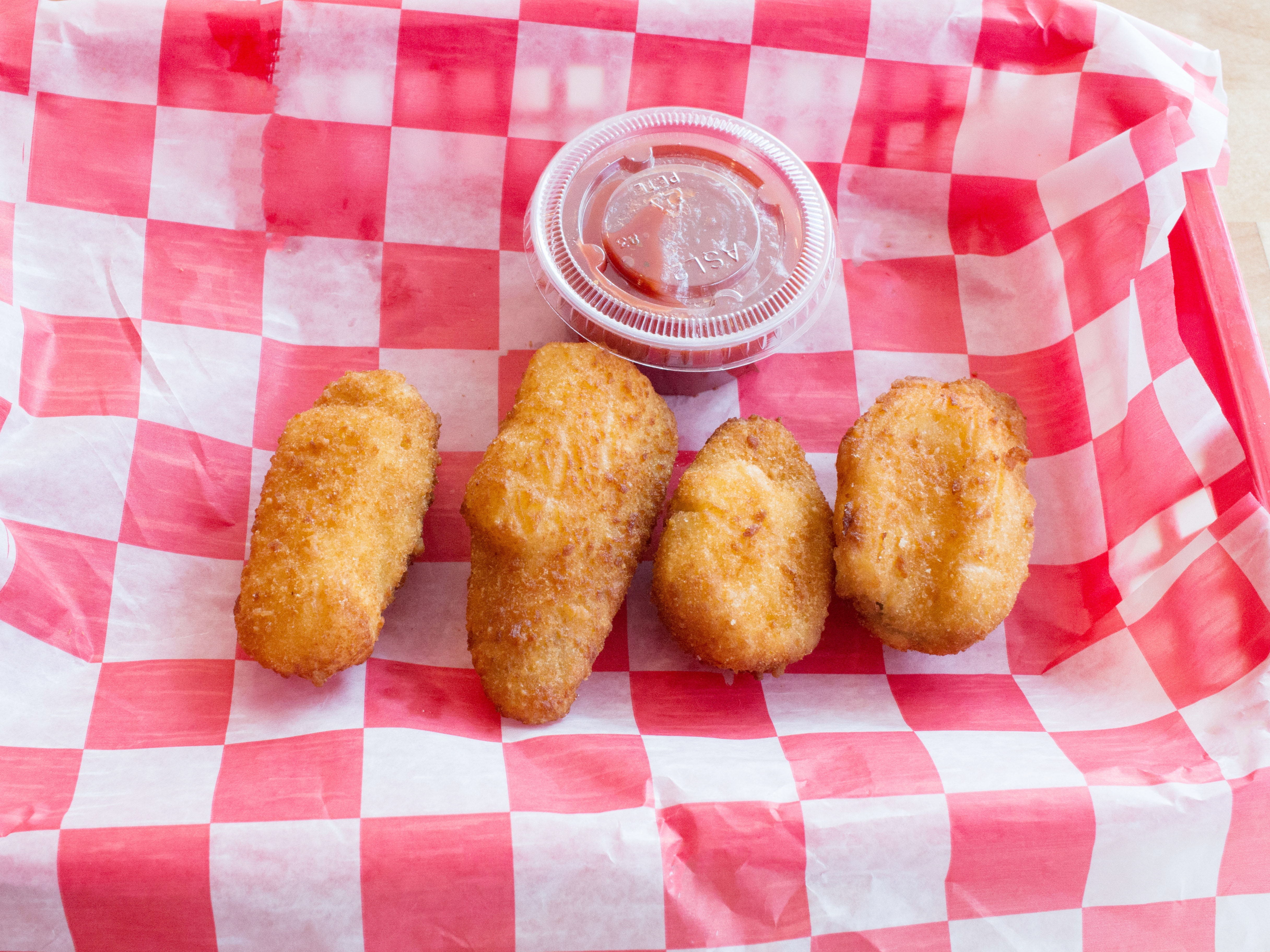 Order 6 Piece Jalapeno Poppers food online from Milan Pizzeria store, Royal Oak on bringmethat.com