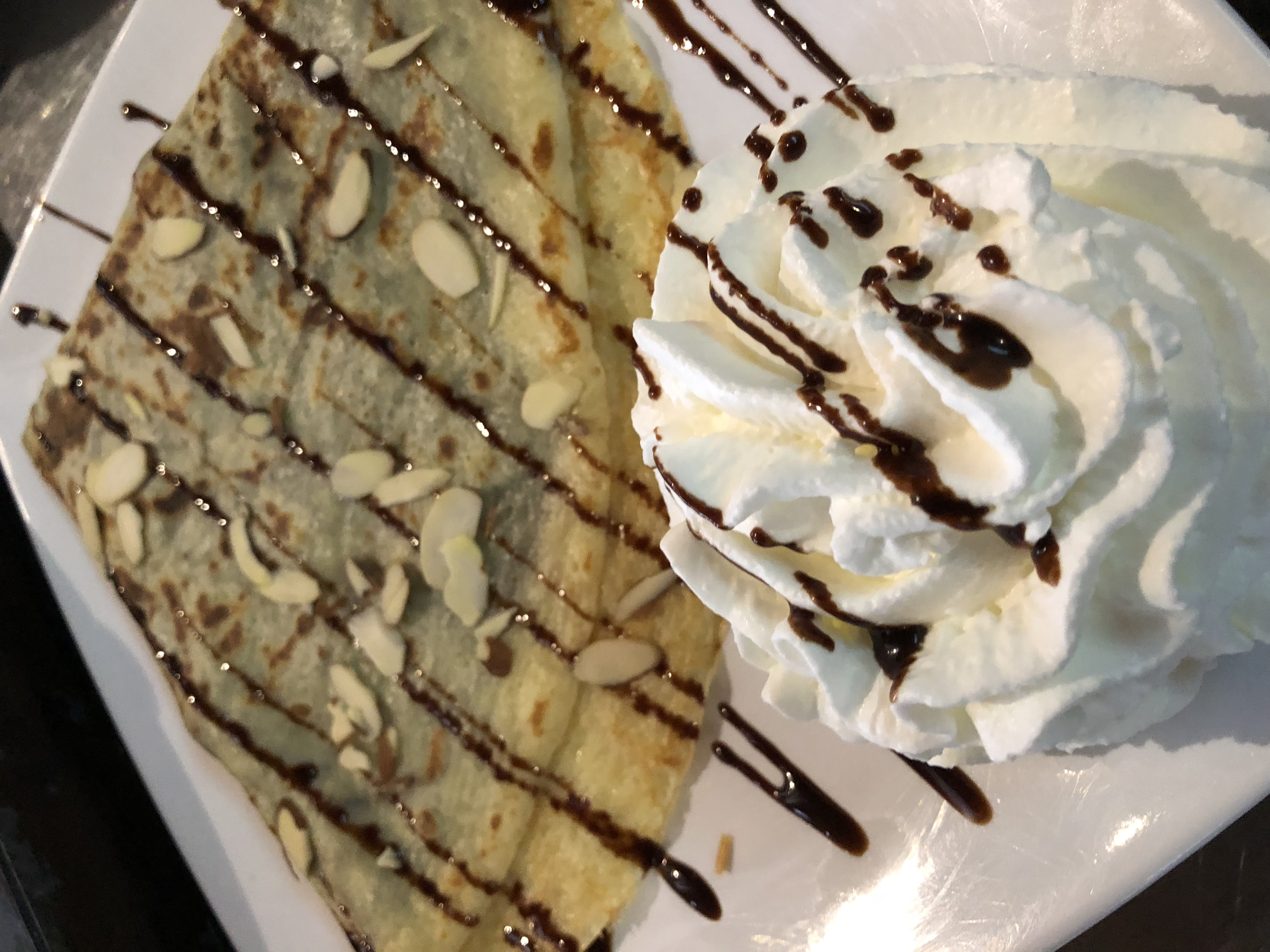 Order Almond Joy Crepe food online from Iguana Cafe store, Chicago on bringmethat.com