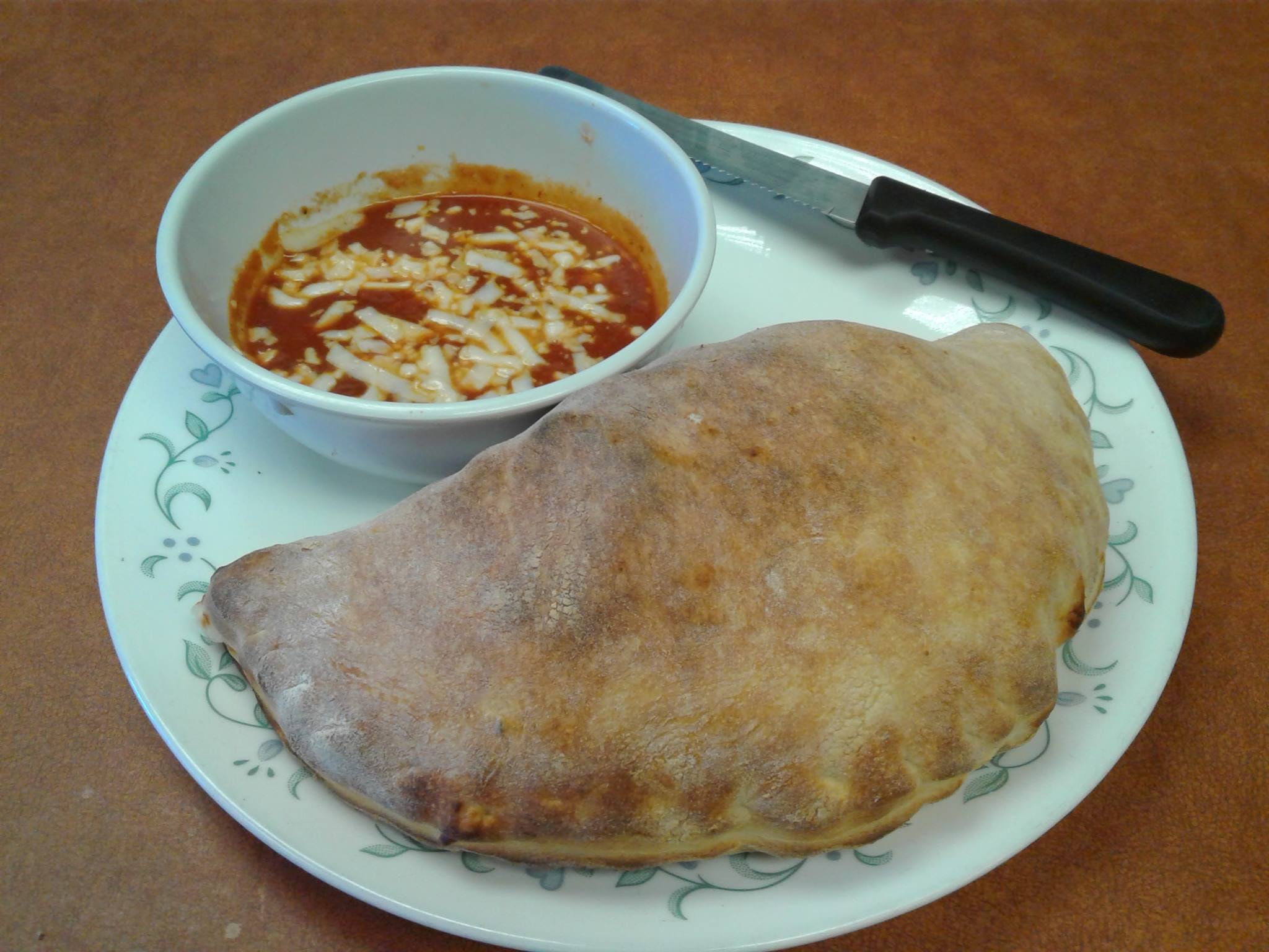 Order Spinach Calzone - Calzone food online from Famous Pizza store, Denver on bringmethat.com
