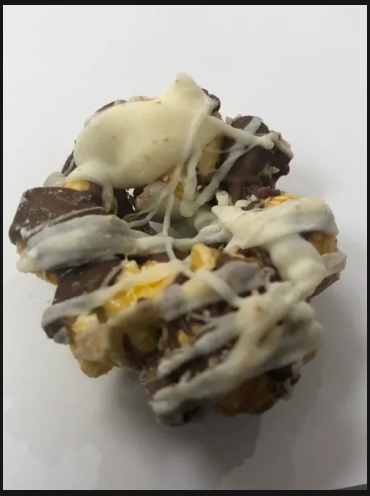 Order Zebra Drizzle food online from Avery's Savory Popcorn store, Dallas on bringmethat.com