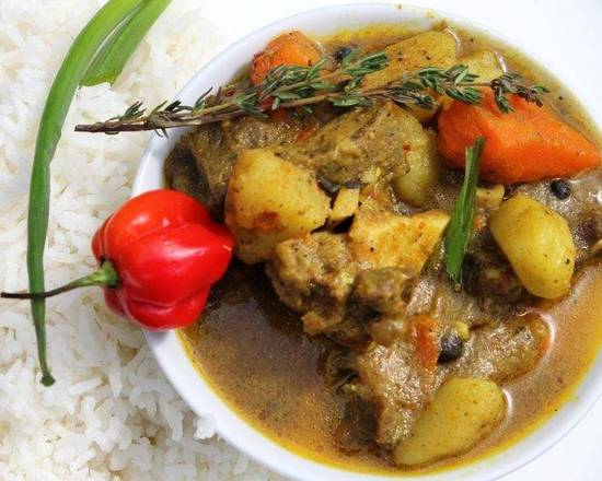 Order Curried Goat food online from Hot Spot Jamaican American Cuisine store, Albany on bringmethat.com