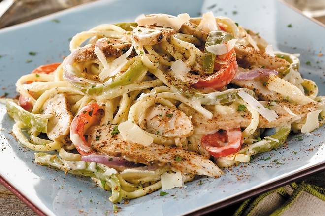Order New Orleans Cajun Chicken Pasta Family-Style Meal food online from O'Charley's store, St. Peters on bringmethat.com