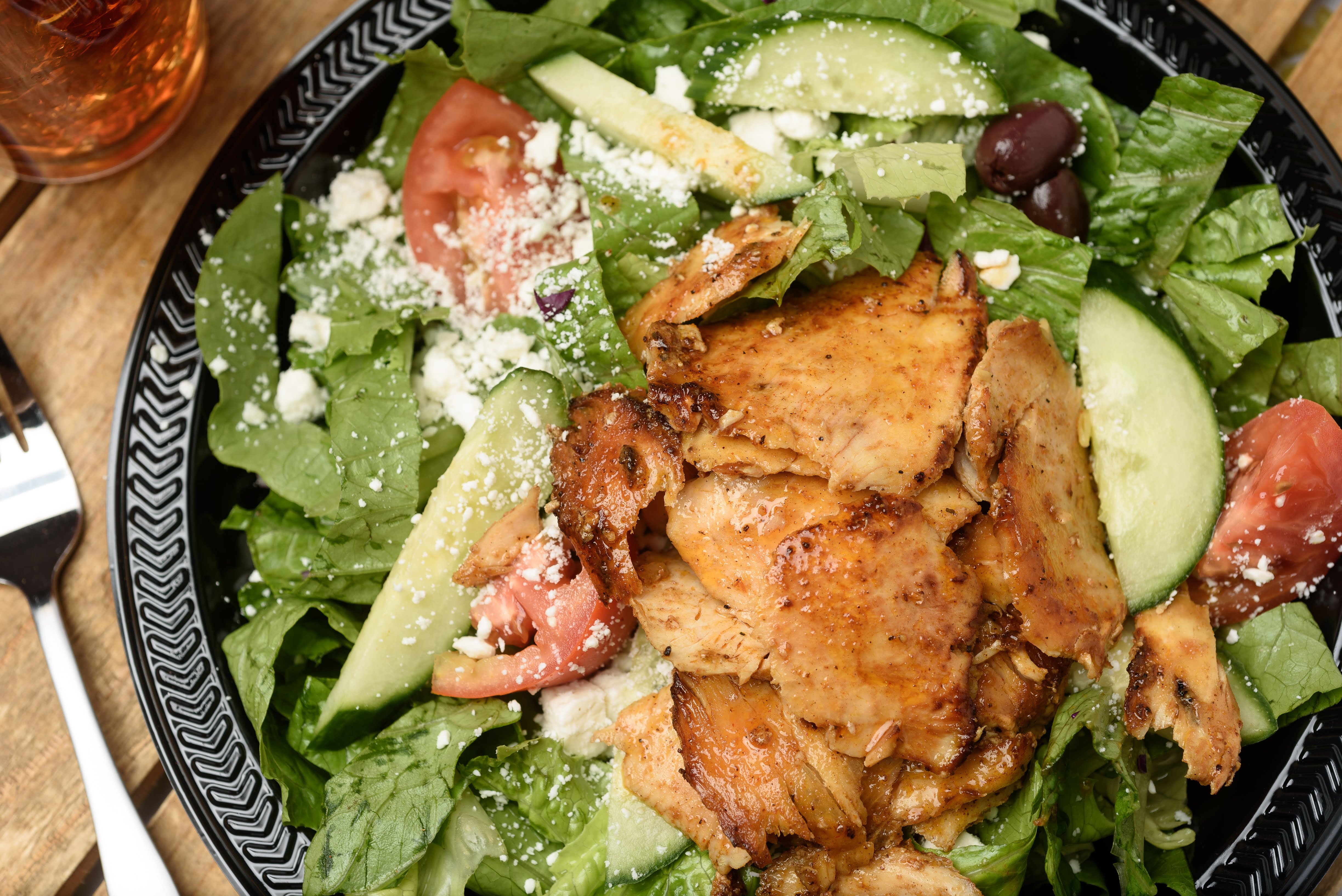 Order Greek Salad with Chicken food online from Zorbas store, Youngsville on bringmethat.com