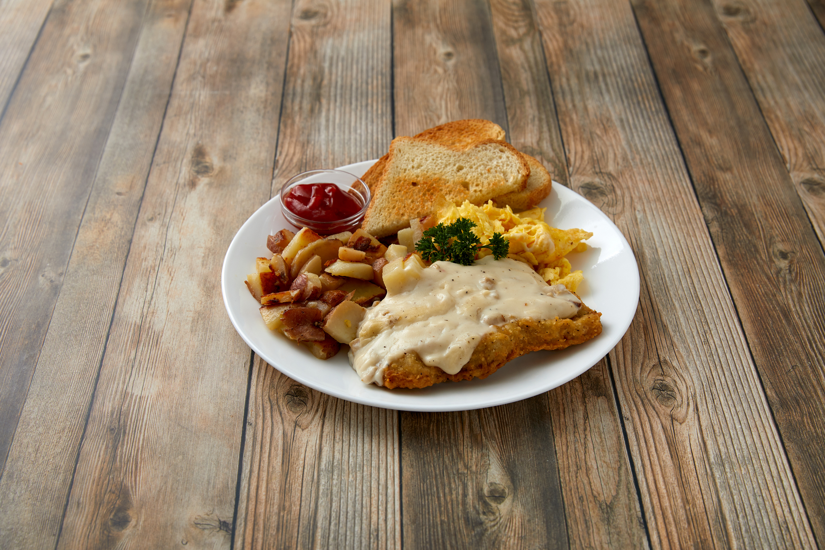 Order Chicken Fried Steak and Eggs food online from Al Cafe In The Village store, Carlsbad on bringmethat.com