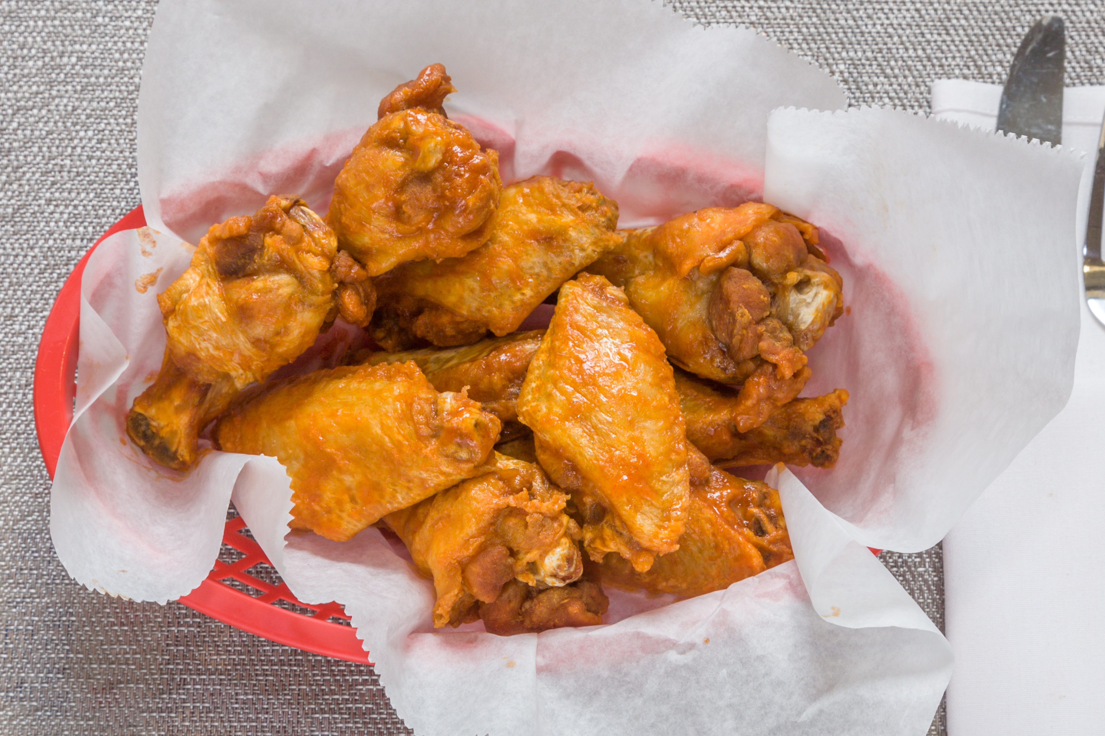 Order 10 Piece Wings Basket food online from Foster's Grille store, Alexandria on bringmethat.com