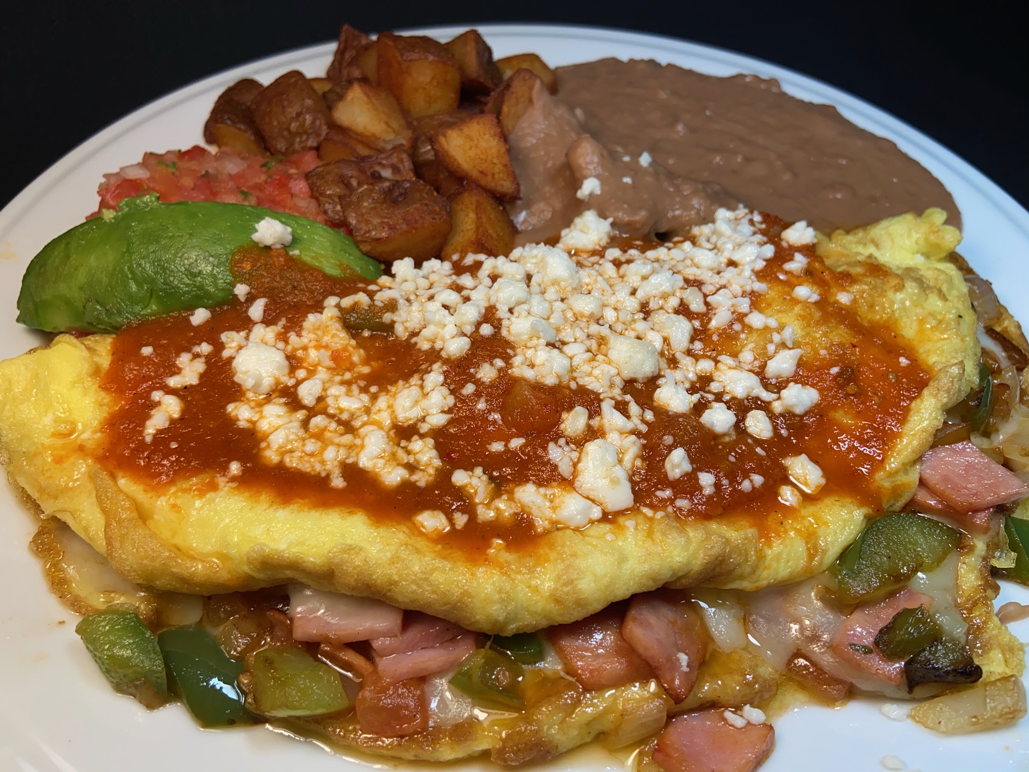 Order Omelet a la Mexicana Plate food online from Adelita Taqueria Restaurant & Bar store, San Jose on bringmethat.com