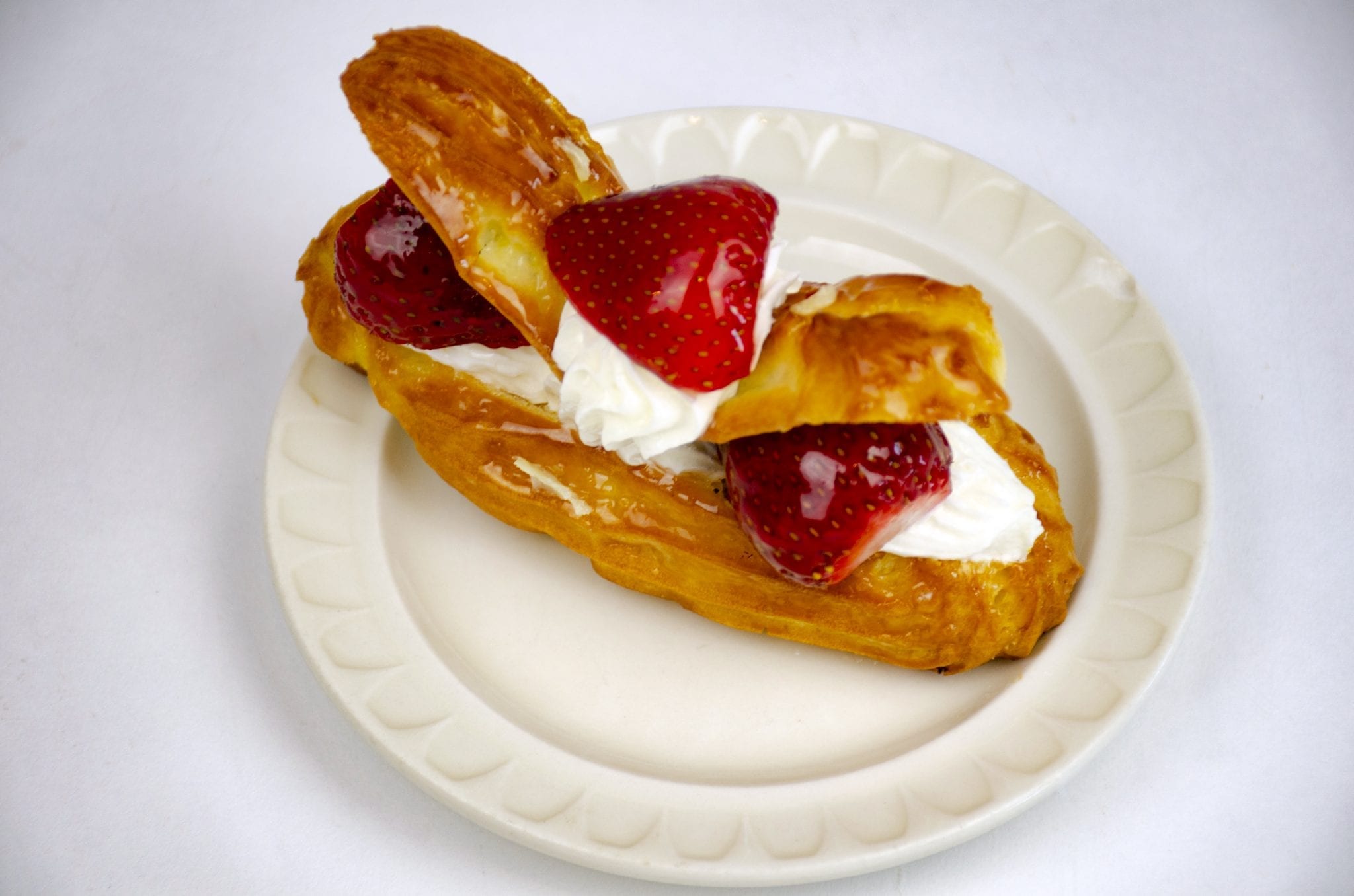 Order Salted Caramel Éclair food online from Cerrato Pastry Shop store, West Springfield on bringmethat.com