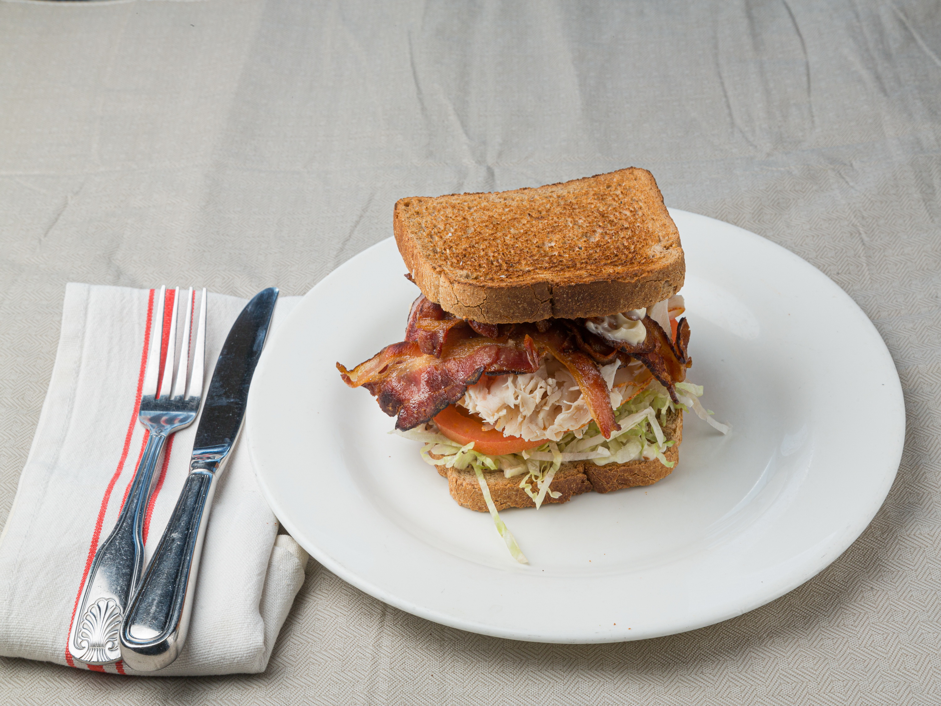 Order Turkey BLT Specialty Sandwich food online from Bagel Emporium store, Yorktown Heights on bringmethat.com