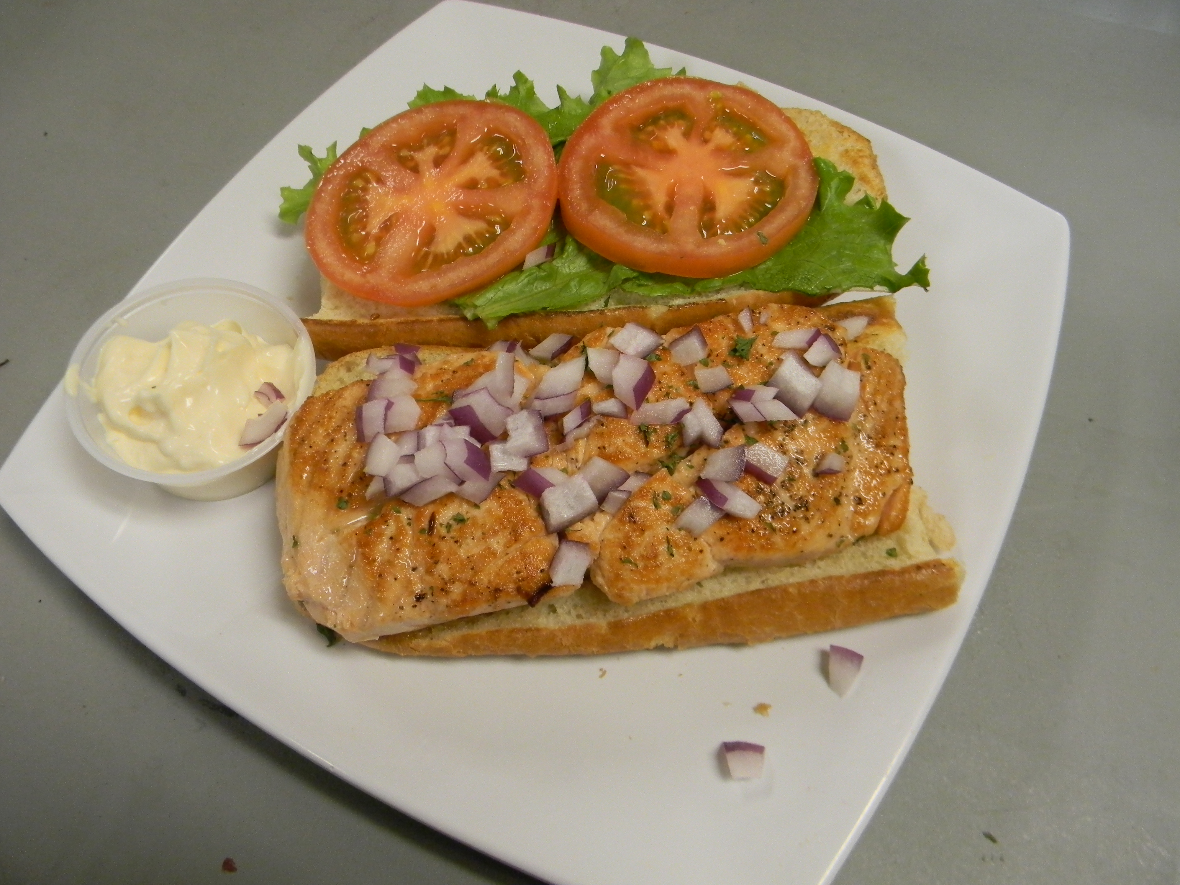 Order Grilled Salmon Sandwich with Aiolo Sauce food online from TJ Cafe store, San Francisco on bringmethat.com