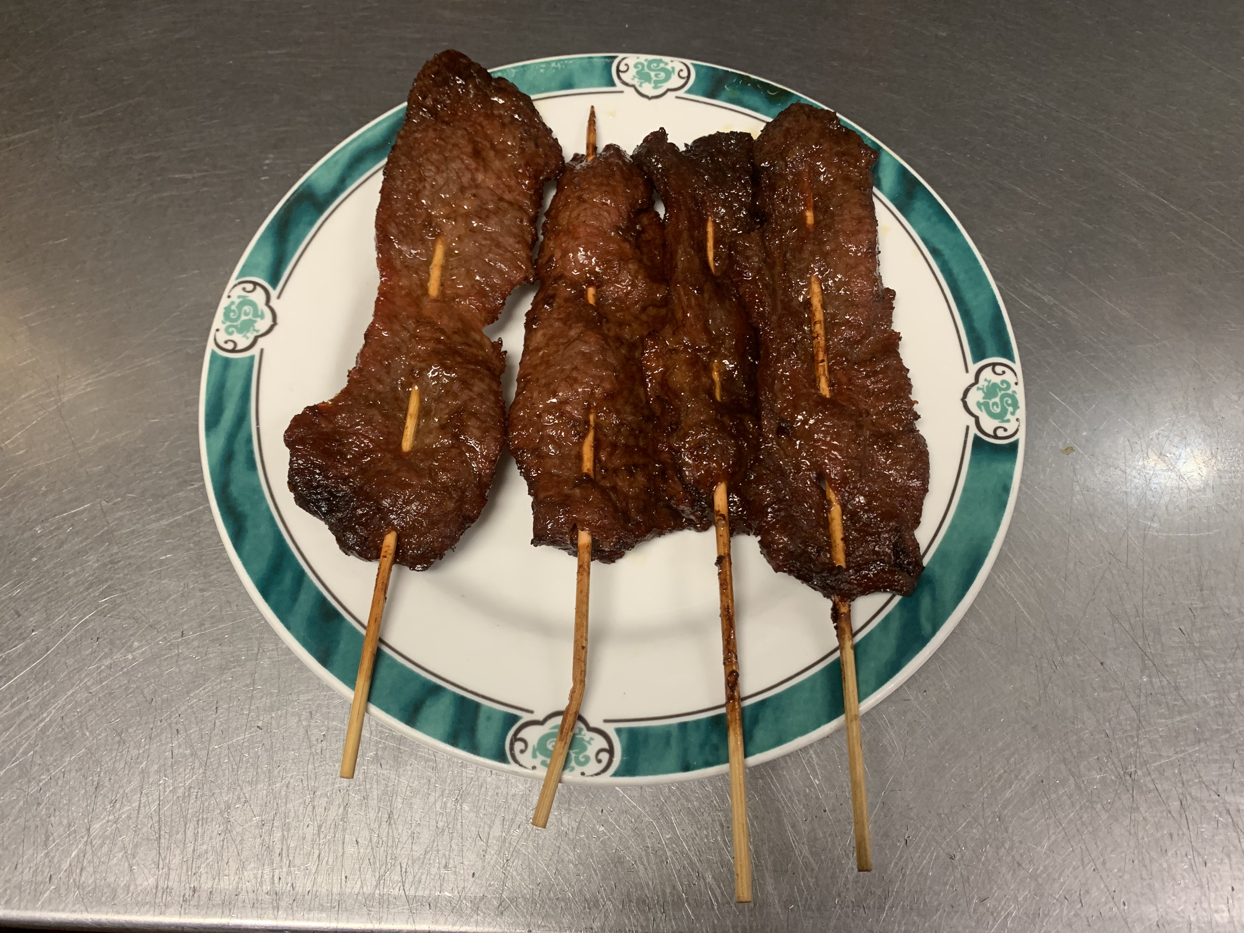 Order A4. Beef on Stick food online from Dragon House store, Fairburn on bringmethat.com