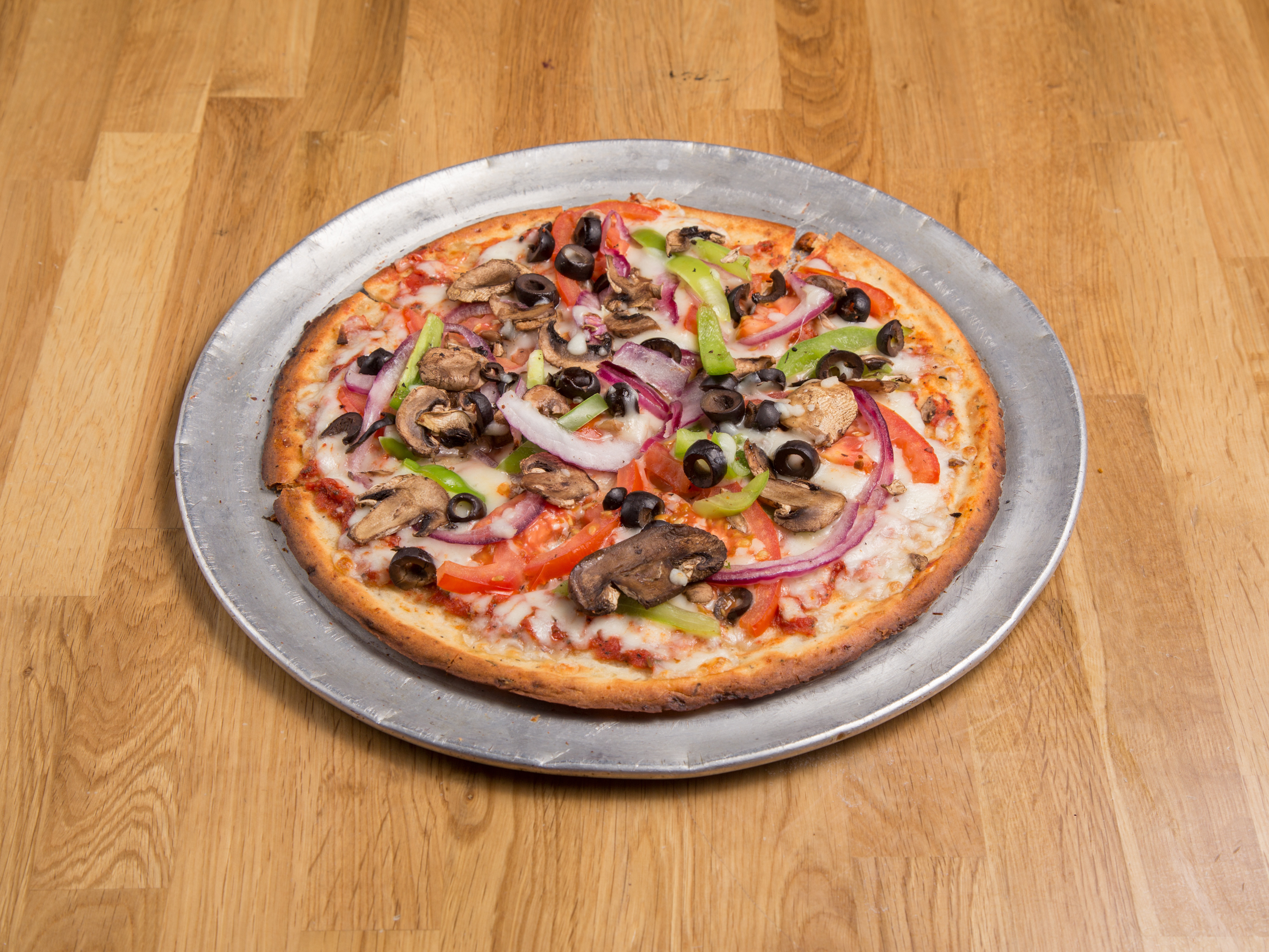 Order 14" DELUXE PIZZA food online from Philly Sports Grill store, Phoenix on bringmethat.com