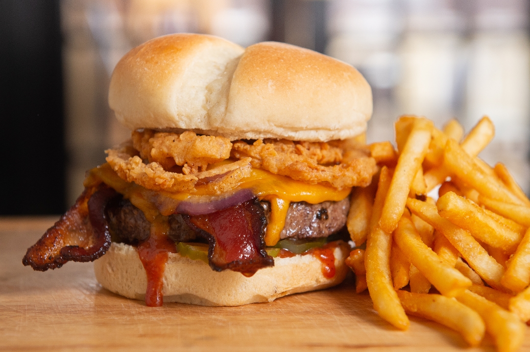 Order THE HONEY BBQ BACON CHEDDAR BURGER food online from Tycoon Flats store, San Antonio on bringmethat.com