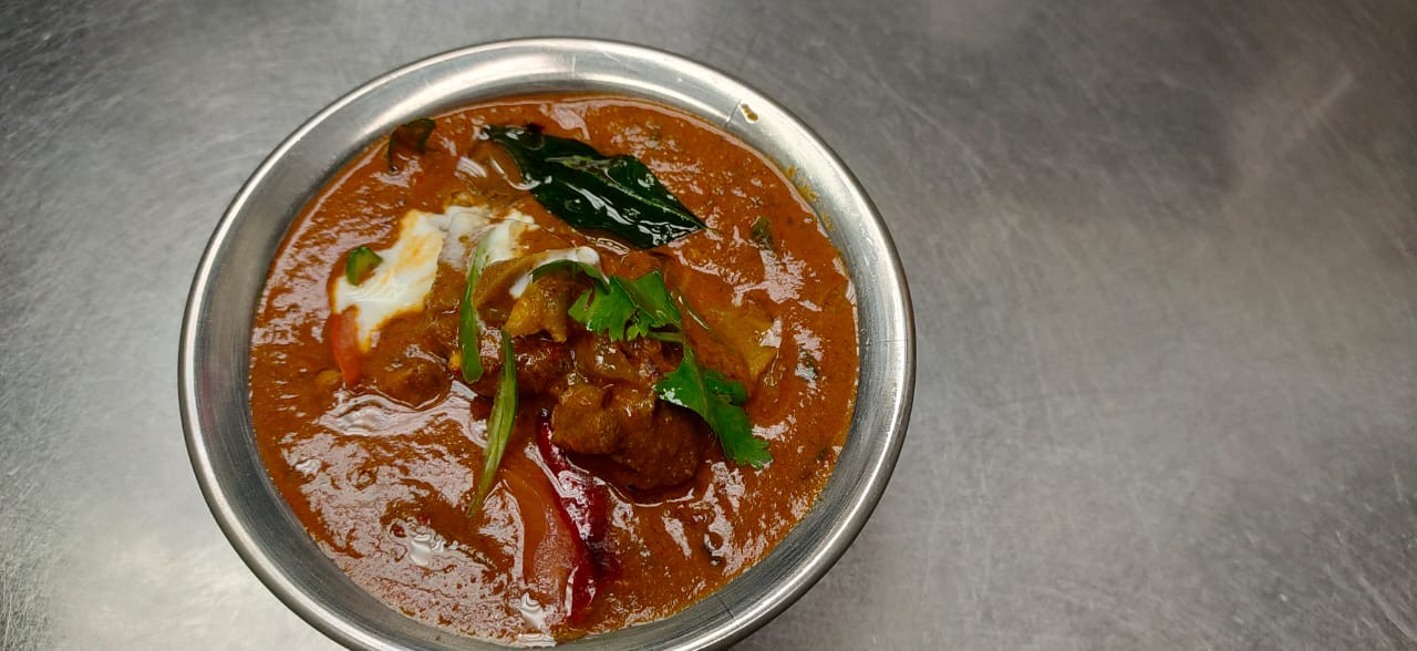 Order Gongura Mutton Curry food online from Agni Indian Cuisine store, Sterling on bringmethat.com