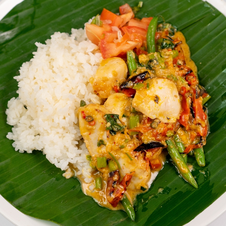 Order Adobo Guinatang (coconut soy based) food online from Click Virtual Food Hall store, Houston on bringmethat.com