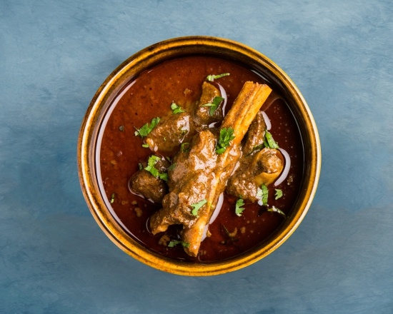 Order Railway Goat Curry  food online from Gunpowder Cafe store, Exton on bringmethat.com