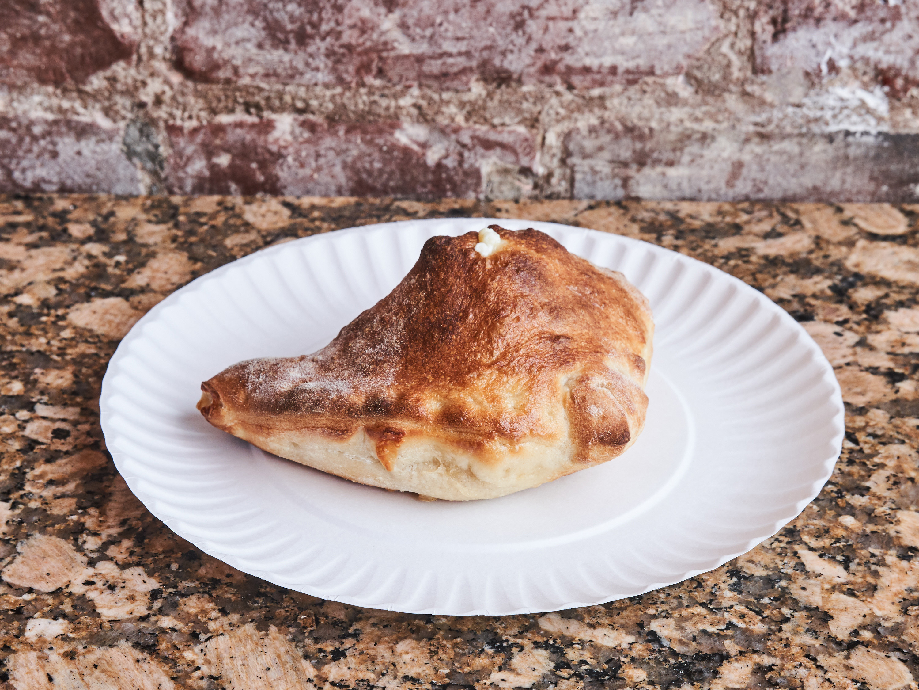 Order Cheese Calzone food online from Village Square Pizza store, New York on bringmethat.com
