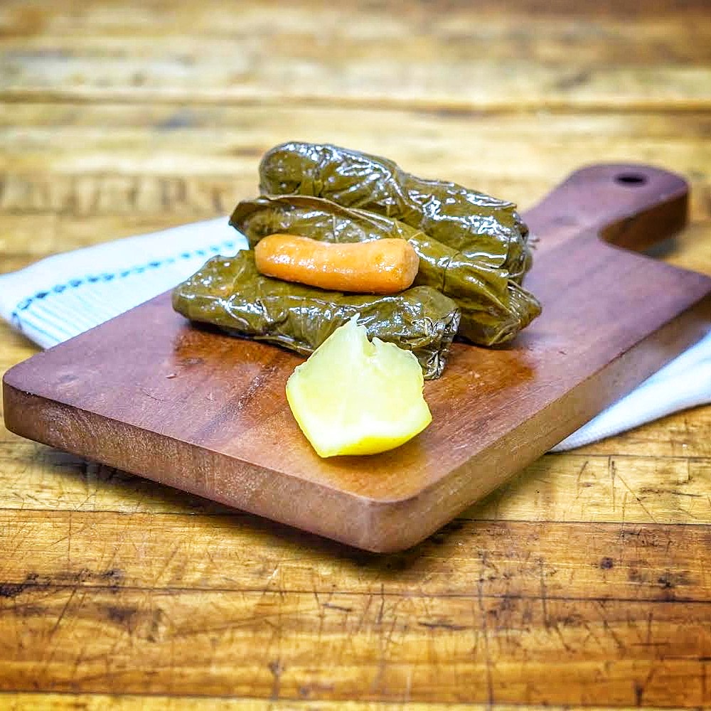 Order 4 Stuffed Grape Leaves food online from Ani Takeout store, Belmont on bringmethat.com