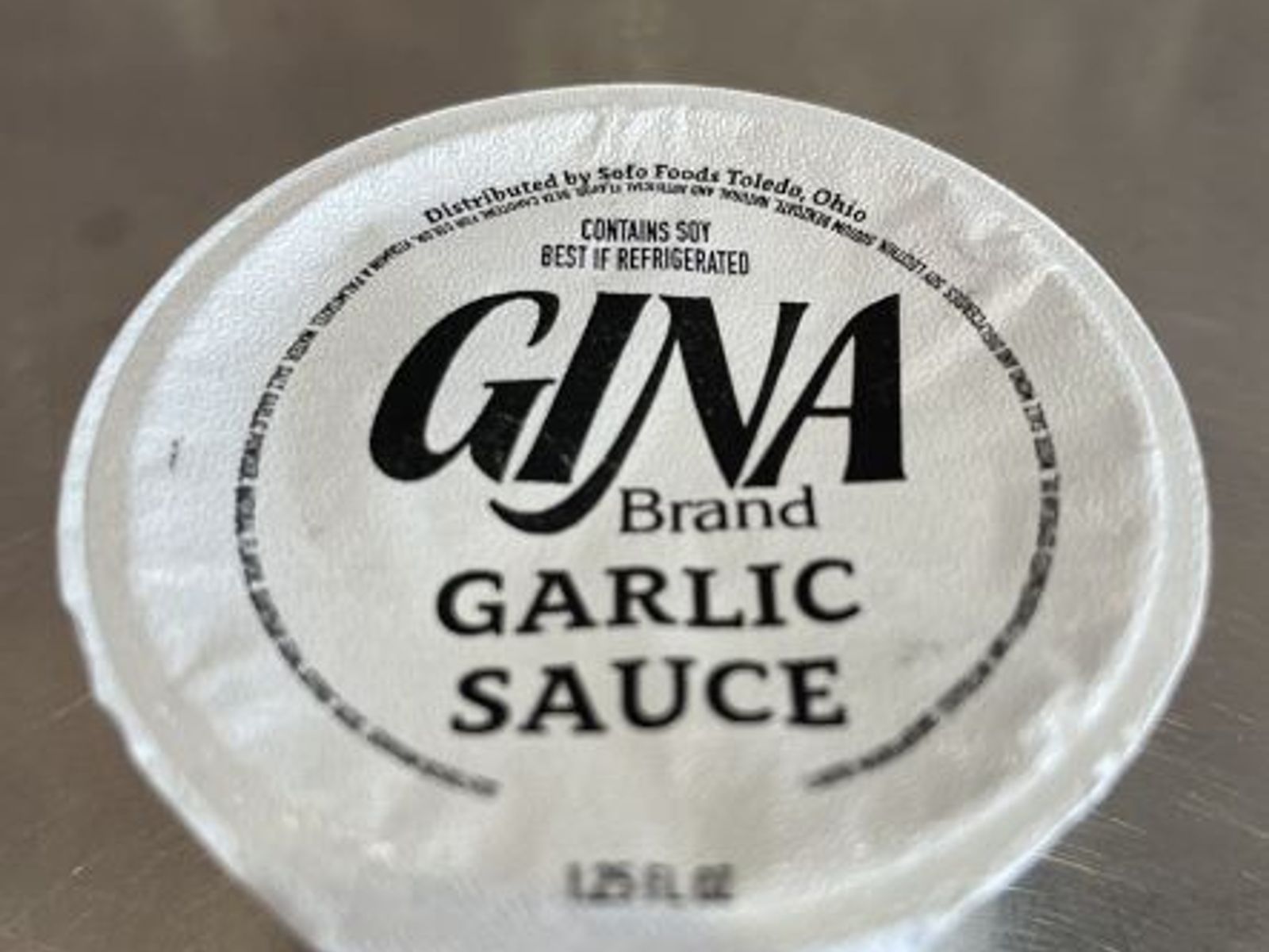 Order Garlic Dipping Sauce food online from Pepperoni's Pizza store, Sugar Land on bringmethat.com
