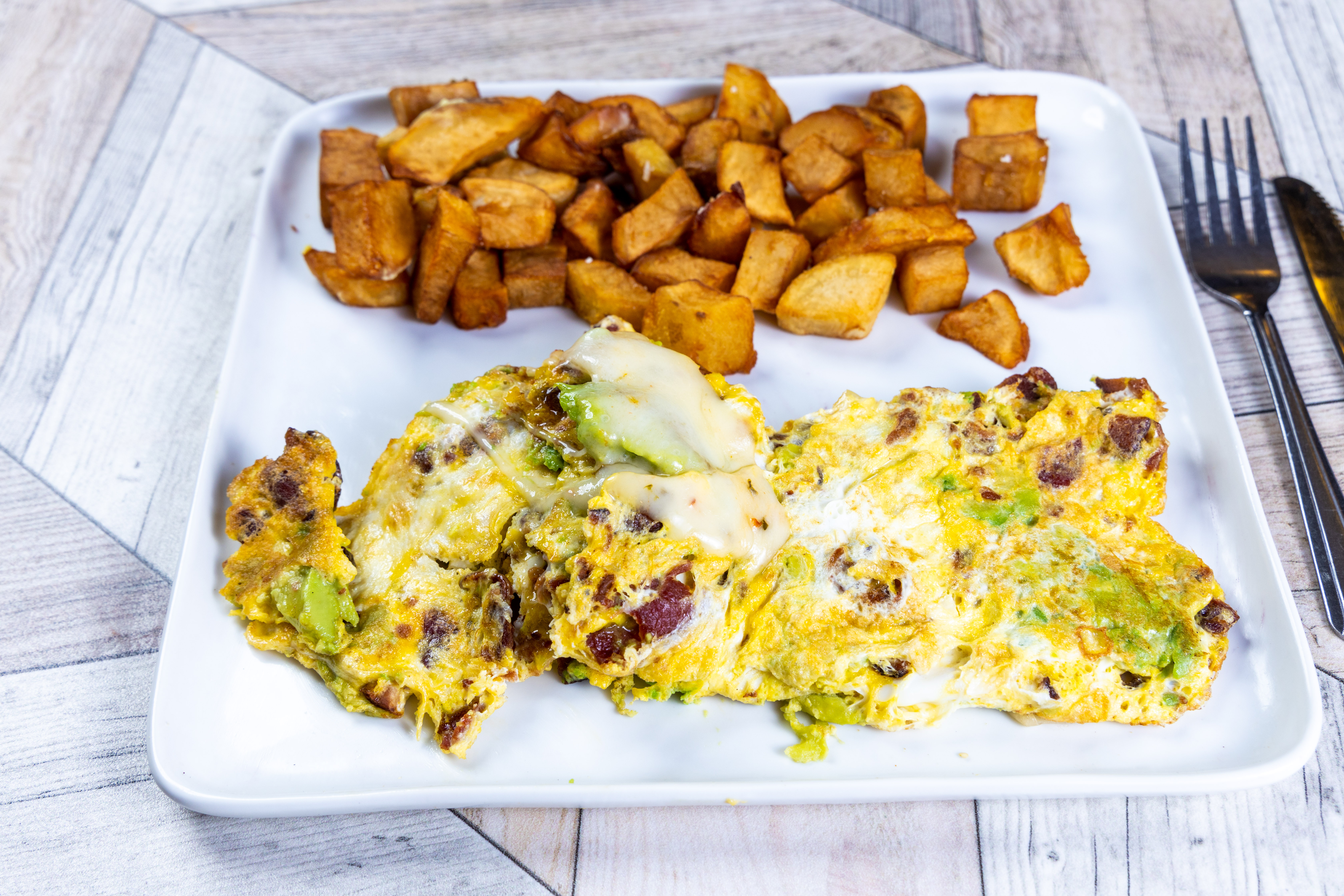 Order Avocado Omelette food online from Top View Restaurant store, Chicago on bringmethat.com