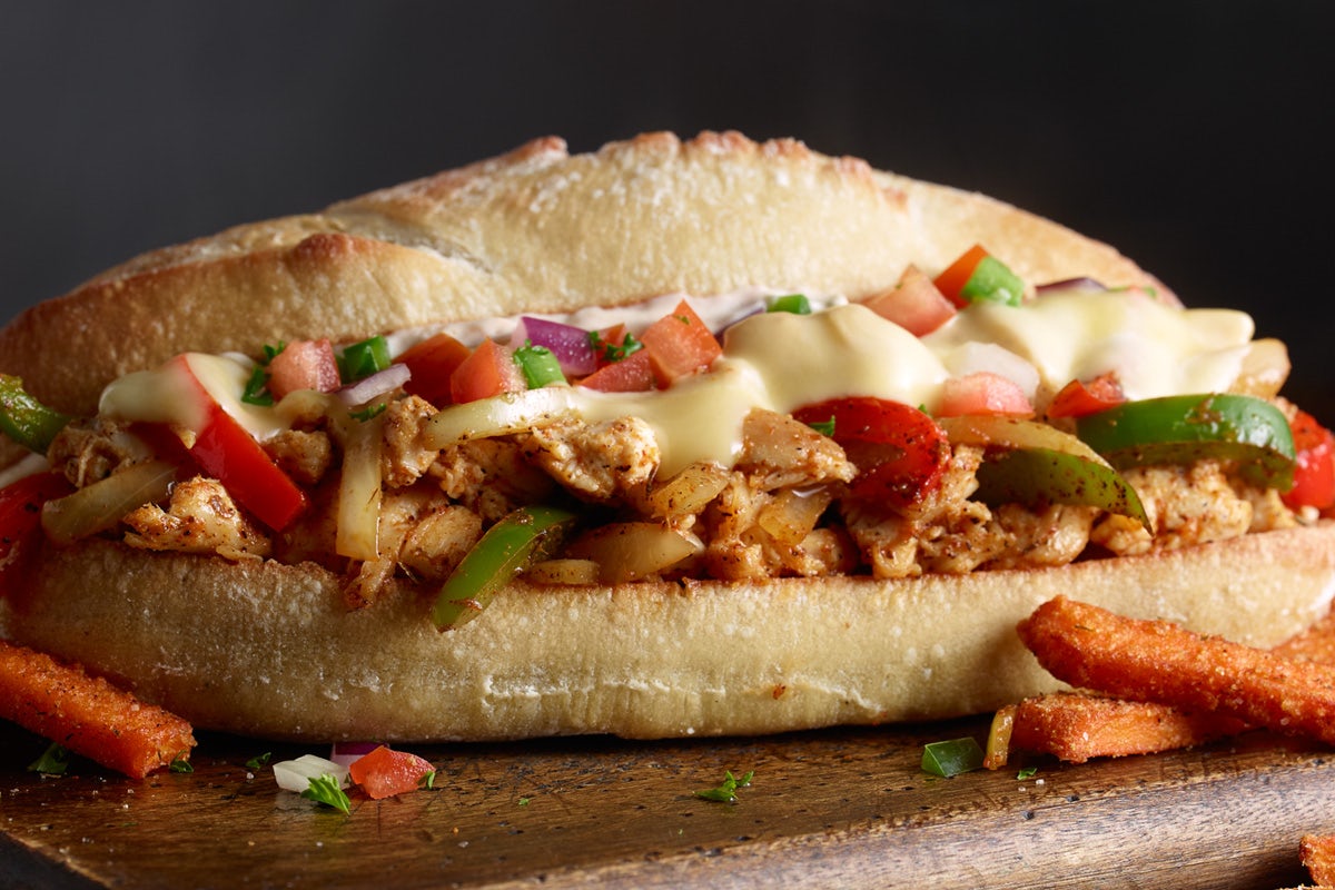 Order CAJUN CHICKEN PHILLY food online from 54th Street Grill & Bar store, Glen Carbon on bringmethat.com