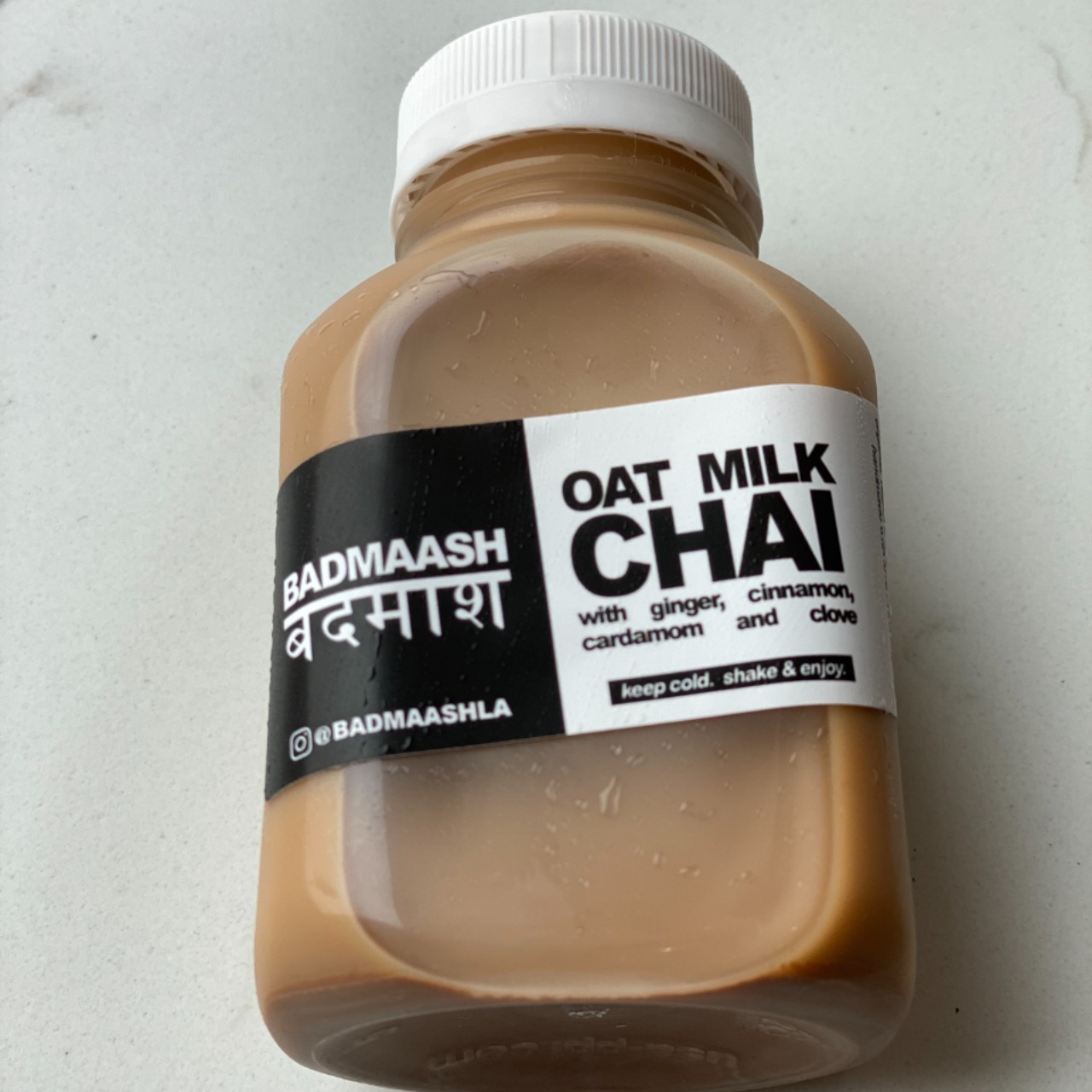Order Badmaash Oatmilk Chai (Served Chilled) food online from The Bombay Frankie Company store, Culver City on bringmethat.com