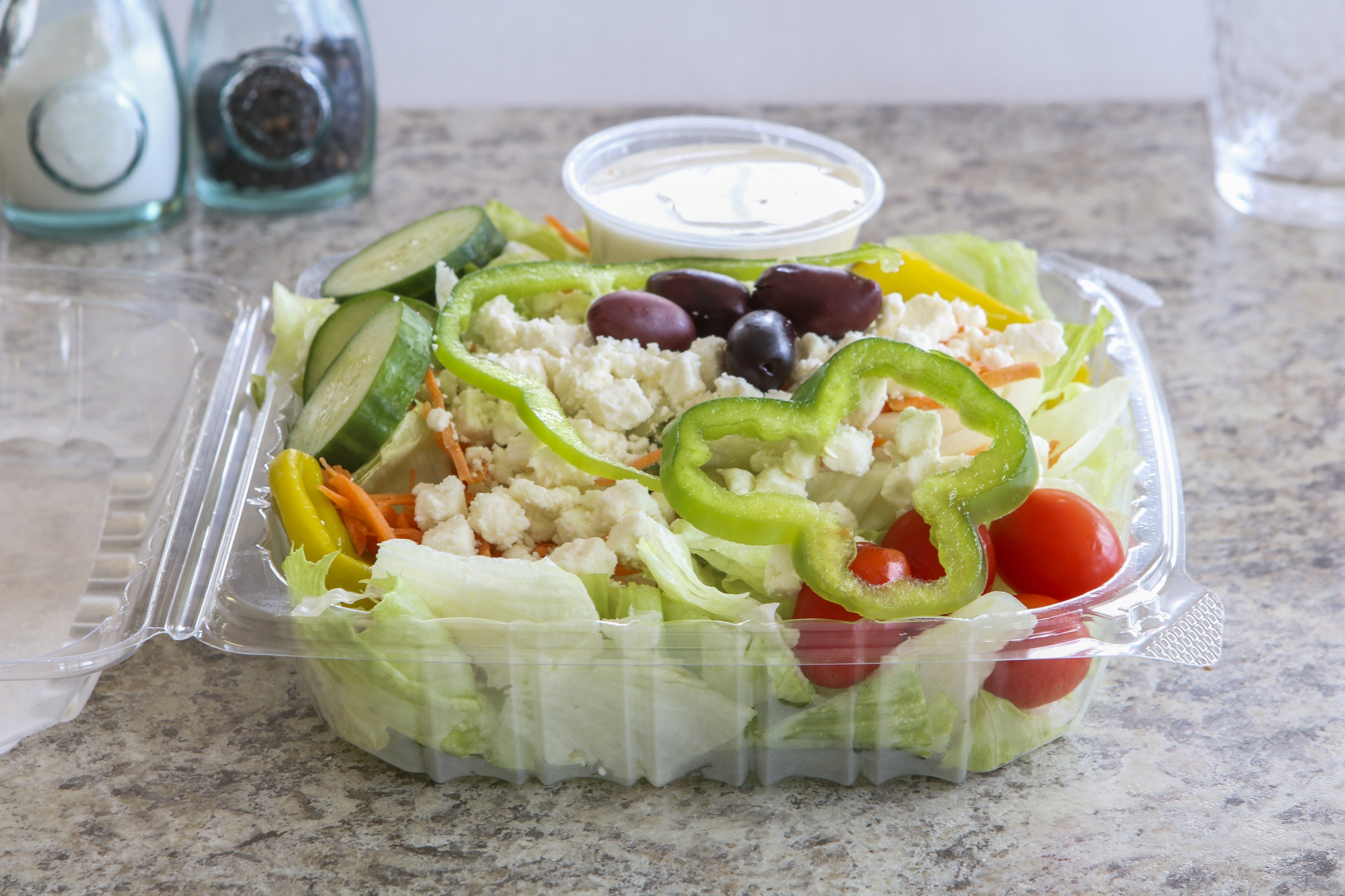 Order Greek Salad - Salad food online from American Pie Of Millbury store, Millbury on bringmethat.com