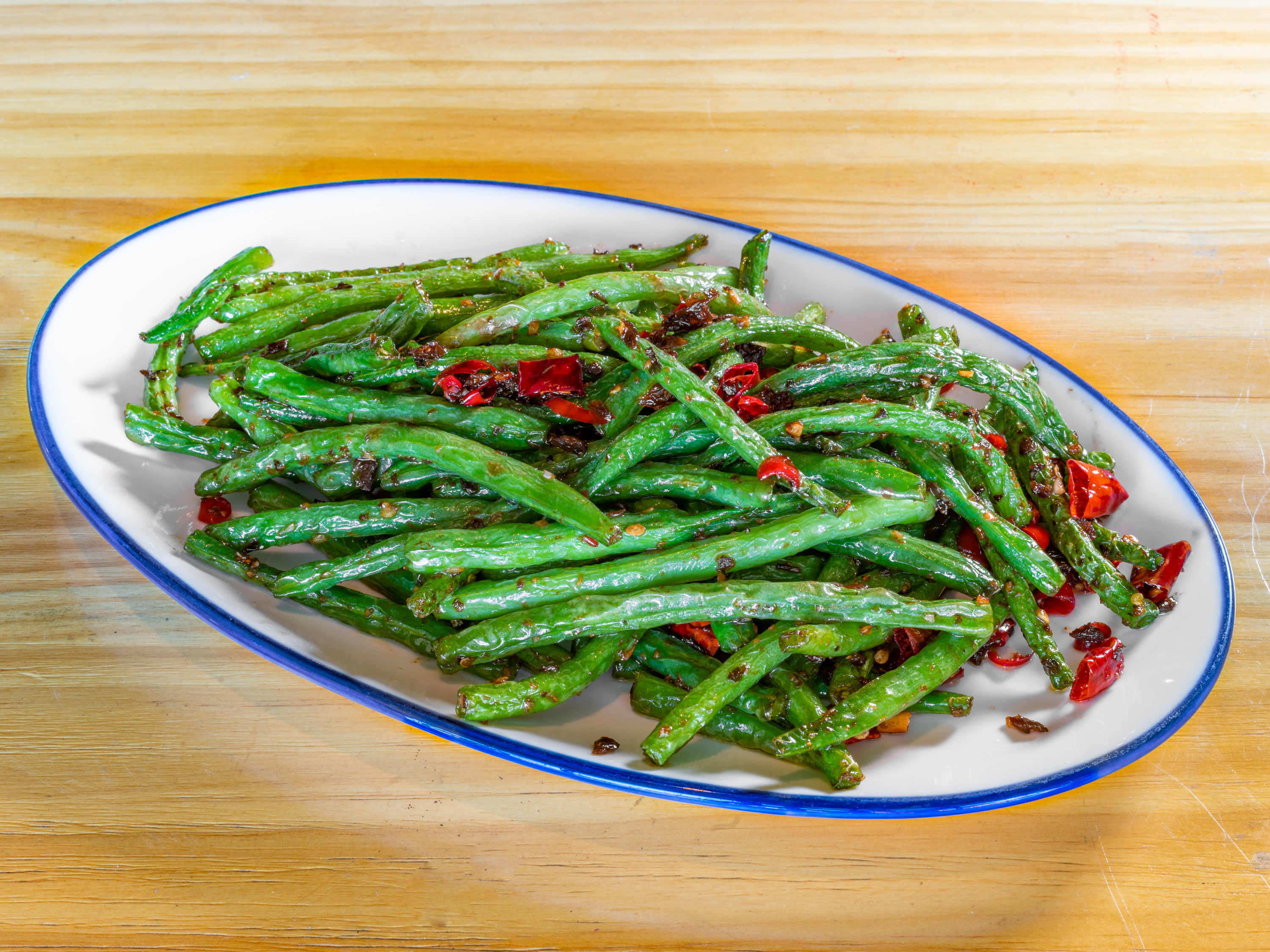 Order Sauteed Green Bean food online from Cafe Wang store, La Verne on bringmethat.com