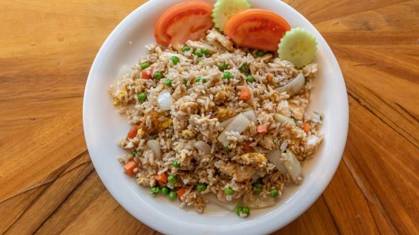 Order 61. Regular Egg Fried Rice with Peas and Carrots food online from Peppers Thai Cuisine store, Palm Desert on bringmethat.com