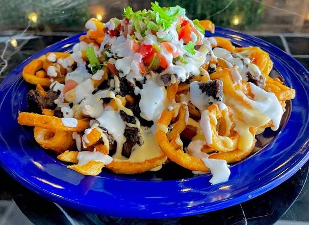 Order Loca Loca Fries food online from Los Pinchis Tacos Mexican Cuisine store, Killeen on bringmethat.com