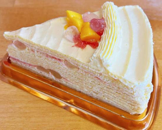 Order Mango Pomelo Mille Crepe Cake (S) food online from Timeless Tea store, Seattle on bringmethat.com
