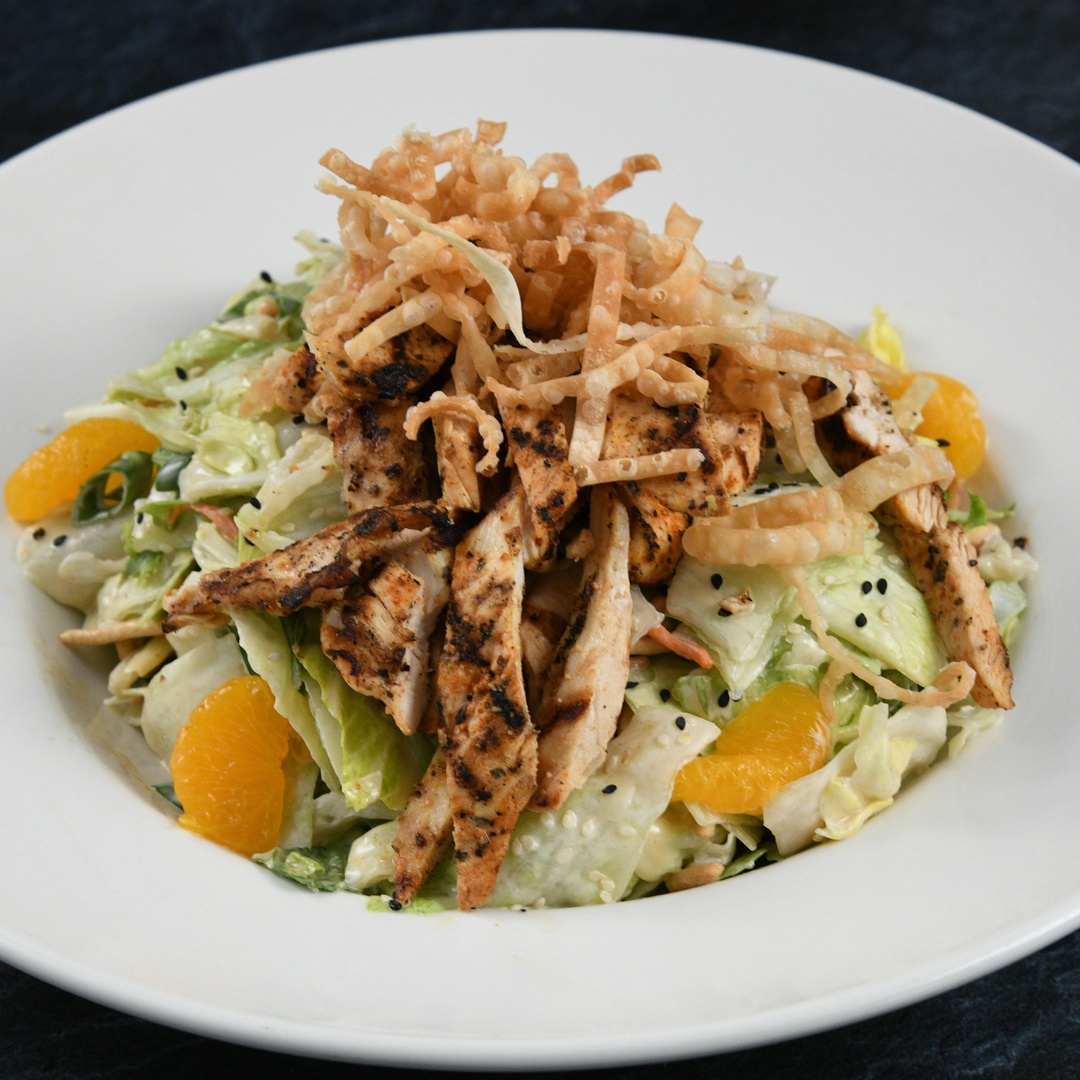 Order China Island Chicken Salad food online from Rainforest Cafe store, Las Vegas on bringmethat.com