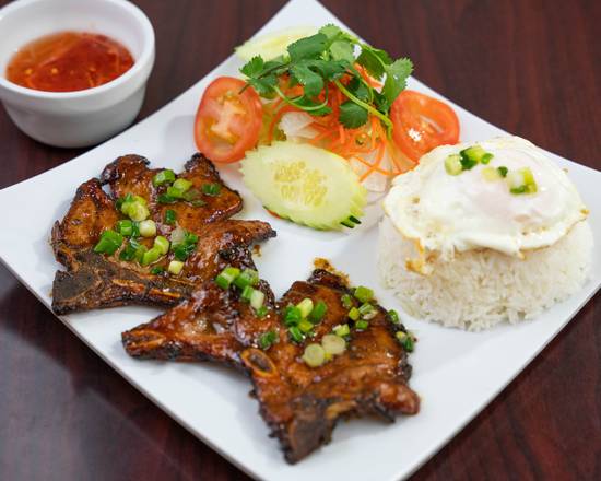Order C8. Grilled Pork Chop food online from Pho Michael Vietnamese Cuisine store, Metairie on bringmethat.com
