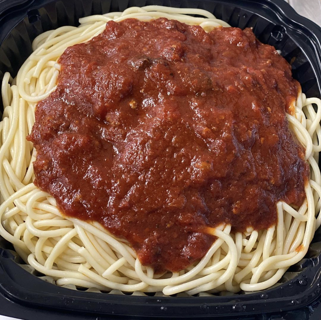 Order Spaghetti with Meat Sauce food online from Demos store, Watertown on bringmethat.com