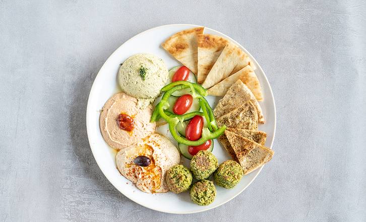 Order Hummus Trio with Falafel food online from Zoe's Kitchen store, Montgomery on bringmethat.com