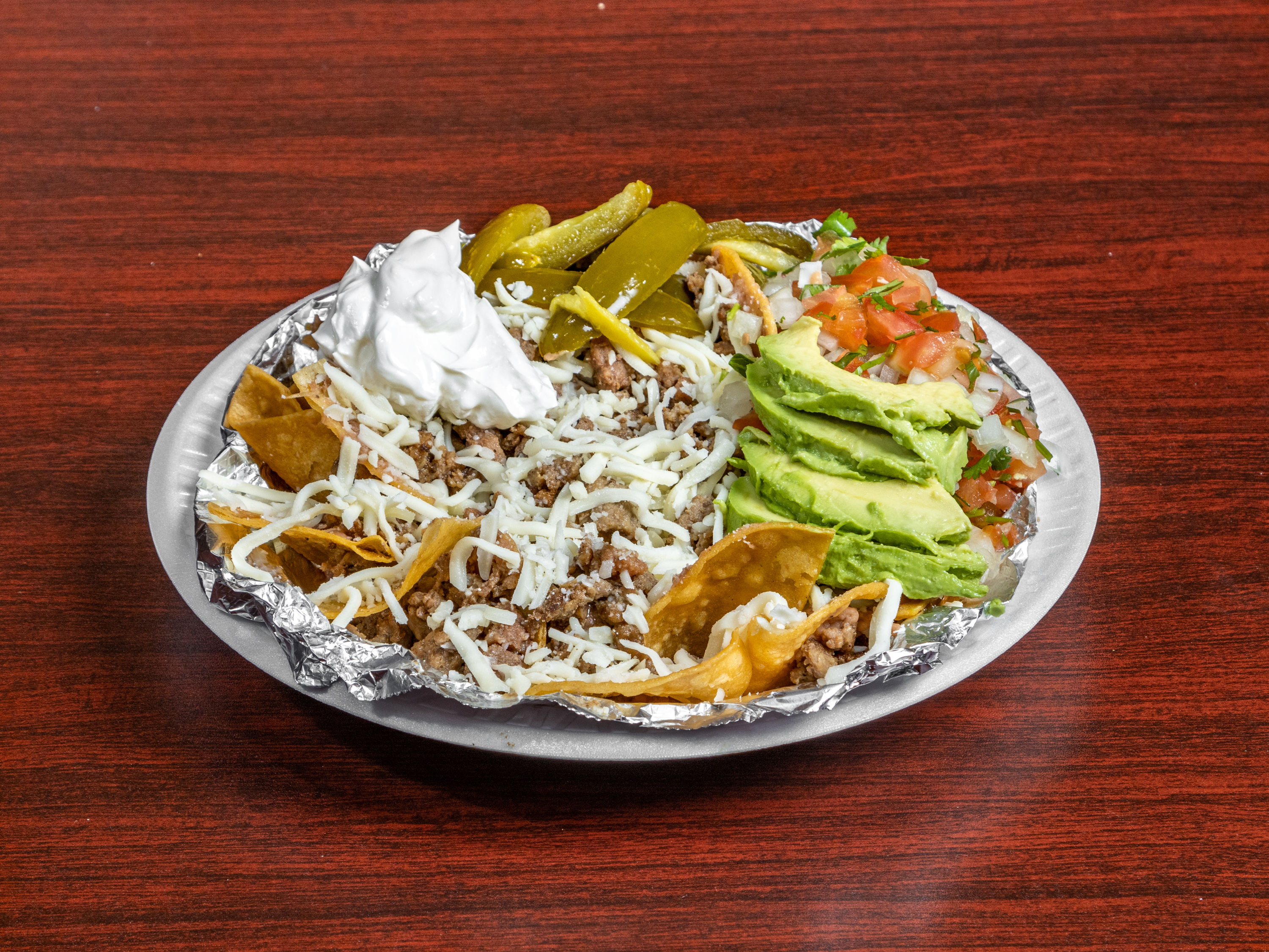 Order Nacho Plate food online from Exxon Taqueria & Grill store, Balch Springs on bringmethat.com