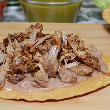 Order Carnitas Tostada food online from Federico Mexican Food store, Scottsdale on bringmethat.com