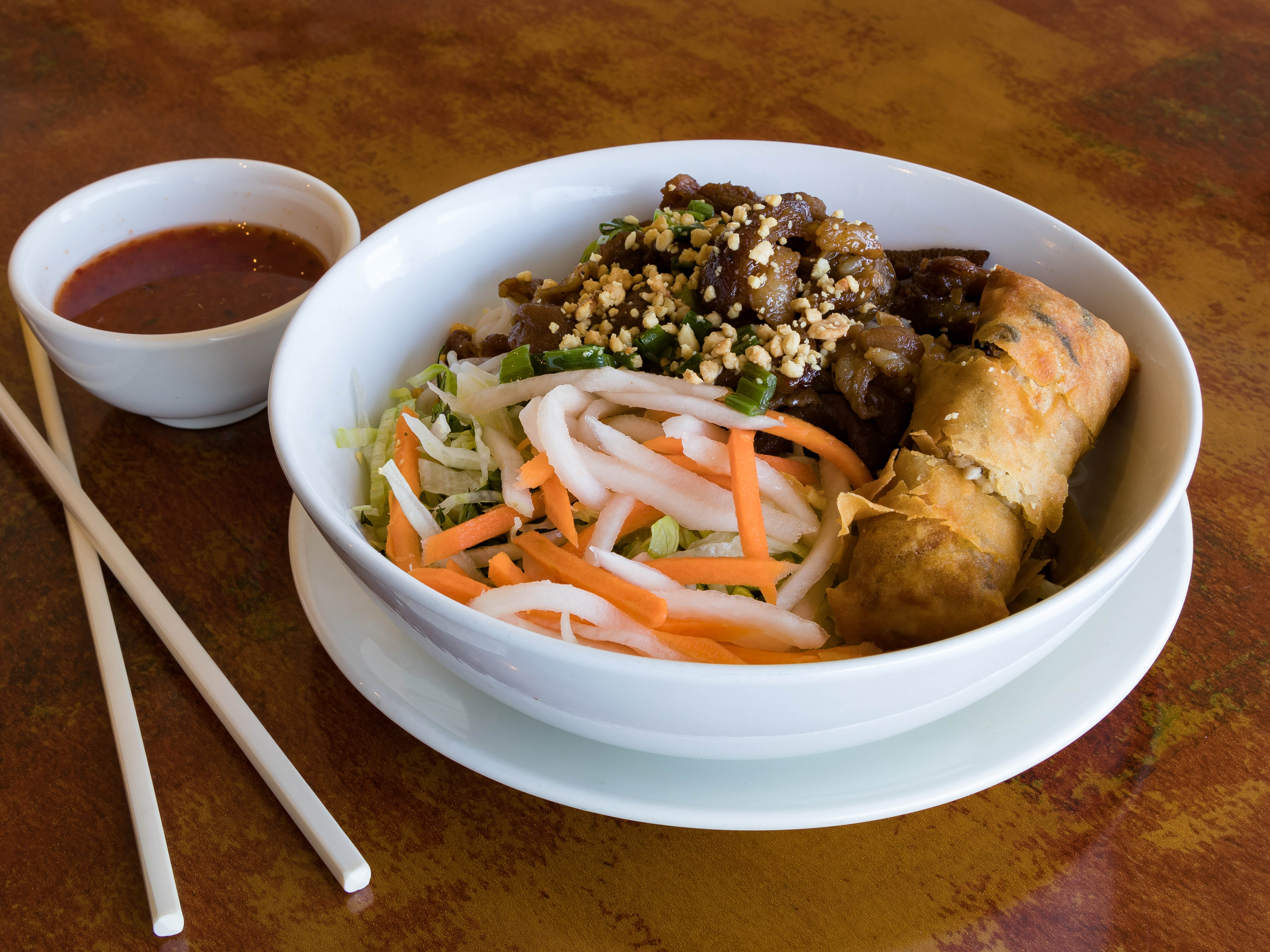 Order 45. Vermicelli with BBQ Pork and Spring Roll food online from Pho Saigon store, Philadelphia on bringmethat.com