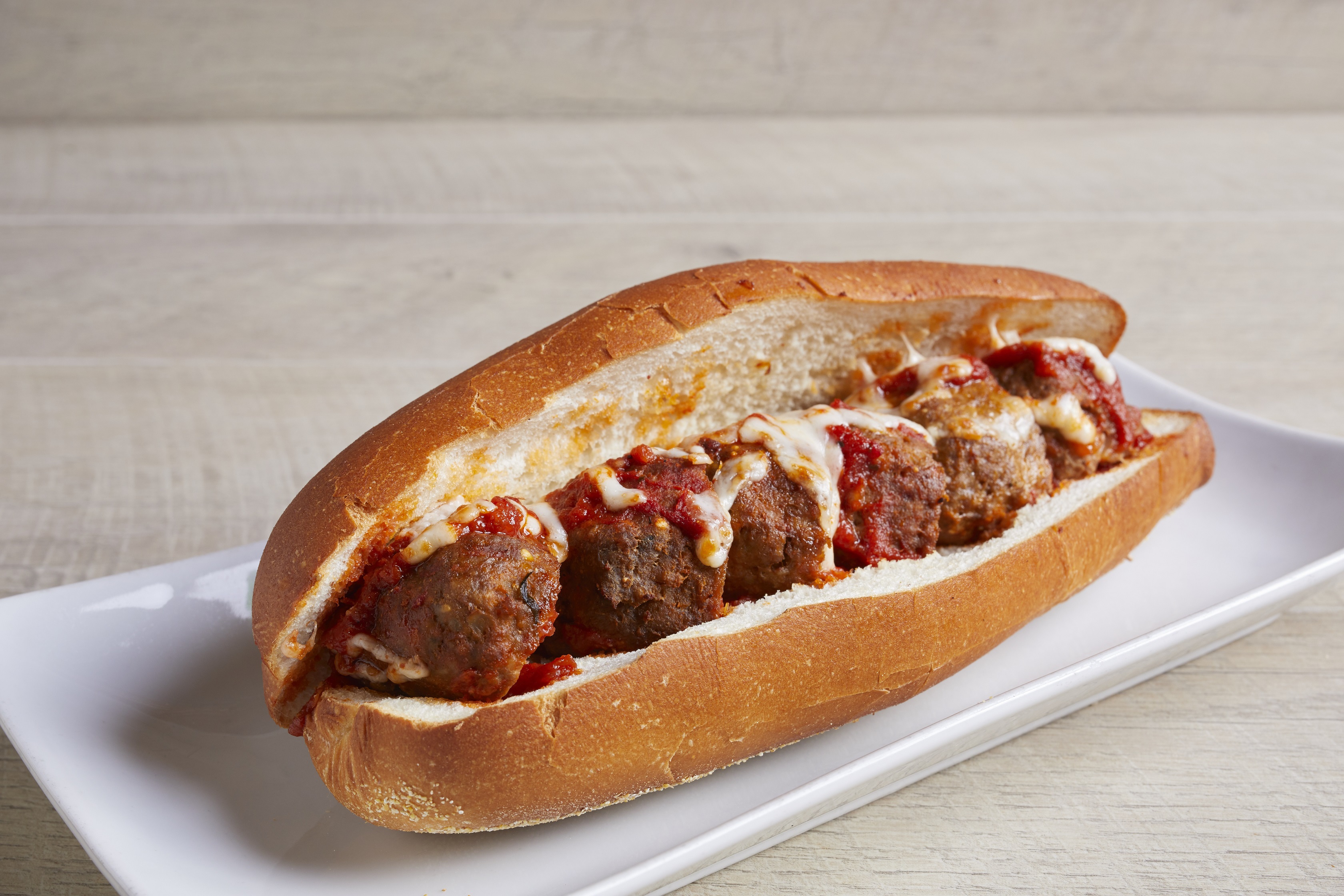 Order Meatball Parmigiana Hero food online from Mario's Pizzeria store, East Northport on bringmethat.com