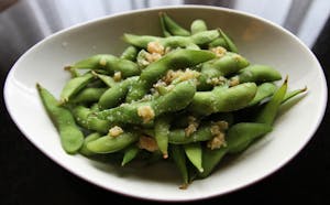 Order Edamame food online from Marco Polo's store, Westbury on bringmethat.com