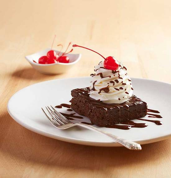 Order KIDS BROWNIE food online from California Pizza Kitchen store, Long Beach on bringmethat.com