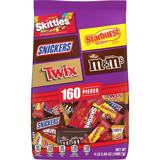 Order M&M'S Milk Chocolate, SKITTLES, SNICKERS, STARBURST & TWIX Halloween Candy Assortment, 66.69 OZ food online from Cvs store, Jefferson County on bringmethat.com